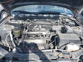 1998 Toyota RAV4 with VIN JT3GP10V7W7037711, listed as a IAAI auction lot 42081313 with 233,554 mi miles. Bid and sale history available at carsss.com. Image 10.