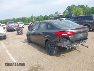 2018 Ford Focus SE with VIN 1FADP3F29JL288761, listed as a IAAI auction lot 42290510 with 93,463 mi miles and . Bid and sale history available at DreamBid. Image 3.