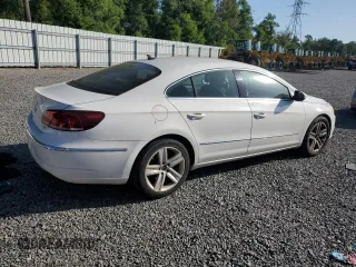 2013 Volkswagen CC Sport z VIN WVWBN7AN7DE511176, wystawiony jako Copart lot #54985945 z przebiegiem 102 993 mil mil oraz Czysty tytuł • Clean title. Historia ofert i sprzedaży dostępna na DreamBid. Obrazek 3.