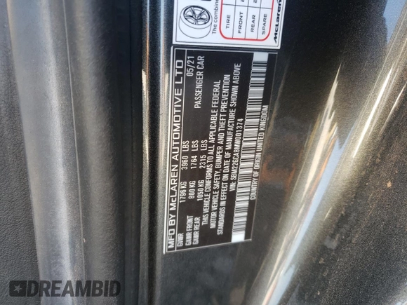 2021 McLaren GT z VIN SBM22GCA8MW001374, wystawiony jako Copart lot #82147064 z przebiegiem 32 562 mil mil oraz Nie do naprawy. Historia ofert i sprzedaży dostępna na DreamBid. Obrazek 13.