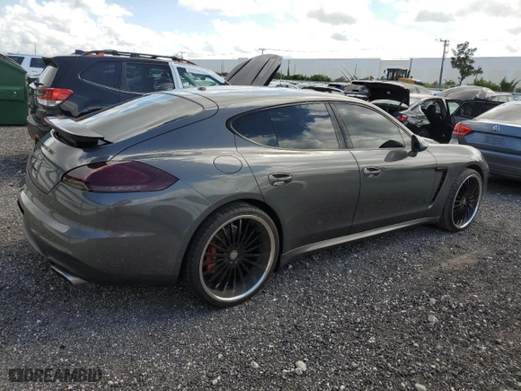2016 Porsche Panamera 4 with VIN WP0AA2A74GL006367, listed as a Copart auction lot 49026323 with 57,384 mi miles. Bid and sale history available at carsss.com. Image 3.