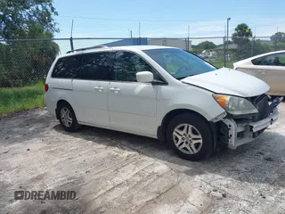 2010 Honda Odyssey EX with VIN 5FNRL3H5XAB015351, listed as a IAAI auction lot 42702296 with 202,919 mi miles and . Bid and sale history available at DreamBid. Image 1.