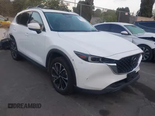2022 Mazda CX-5 2.5 S Premium Plus Package with VIN JM3KFBEM6N0615083, listed as a IAAI auction lot 41907406 with 49,617 mi miles. Bid and sale history available at carsss.com. Image 1.