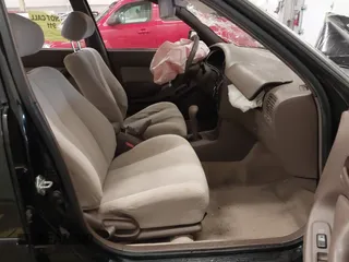 1994 Toyota Camry LE with VIN JT2SK12E3R0207215, listed as a IAAI auction lot 41788670 with 124,010 mi miles. Bid and sale history available at carsss.com. Image 5.