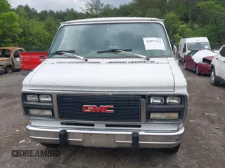 1993 GMC Vandura z VIN 1GTEG25K7PF510652, wystawiony jako IAAI lot #42097211 z przebiegiem 368 766 mil mil oraz . Historia ofert i sprzedaży dostępna na DreamBid. Obrazek 6.