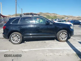2014 Audi Q5 Premium z VIN WA1CFAFP0EA085858, wystawiony jako IAAI lot #41956522 z przebiegiem Nie podano mil oraz . Historia ofert i sprzedaży dostępna na DreamBid. Obrazek 12.