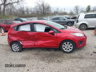 2011 Ford Fiesta SE with VIN 3FADP4EJ9BM216456, listed as a IAAI auction lot 41918530 with 165,989 mi miles. Bid and sale history available at carsss.com. Image 13.
