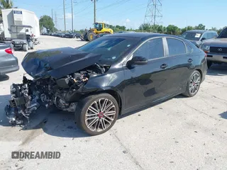 2023 Kia Forte GT with VIN 3KPF44AC0PE678151, listed as a IAAI auction lot 42016937 with 15,882 mi miles and . Bid and sale history available at carsss.com. Image 2.