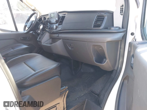 2023 Ford Transit Cargo with VIN 1FTBR1X84PKB02027, listed as a IAAI auction lot 42062820 with 79,813 mi miles and . Bid and sale history available at DreamBid. Image 5.