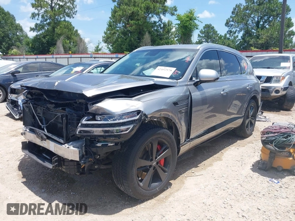 2021 Genesis GV80 with VIN KMUHCESC7MU038058, listed as a IAAI auction lot 42452578 with 63,980 mi miles and . Bid and sale history available at DreamBid. Image 2.