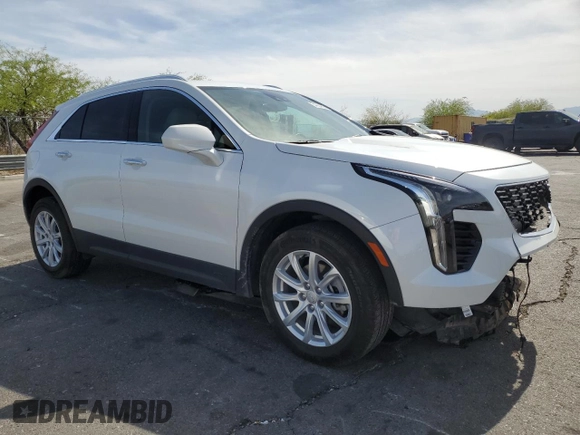 2023 Cadillac XT4 FWD Luxury with VIN 1GYAZAR46PF134602, listed as a Copart auction lot 54684865 with 13,221 mi miles and Salvage title. Bid and sale history available at DreamBid. Image 4.
