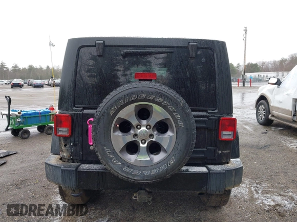 2016 Jeep Wrangler Unlimited 75th Anniversary with VIN 1C4HJWEG3GL181371, listed as a IAAI auction lot 41864965 with 64,259 mi miles and . Bid and sale history available at DreamBid. Image 16.