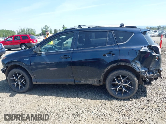 2018 Toyota RAV4 Hybrid SE with VIN JTMJJREV9JD191552, listed as a IAAI auction lot 42158665 with 84,025 mi miles and . Bid and sale history available at DreamBid. Image 14.
