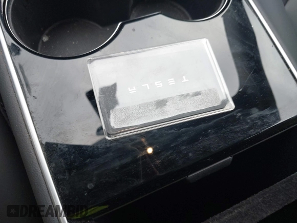 2019 Tesla Model 3 Mid Range with VIN 5YJ3E1EA5KF299589, listed as a IAAI auction lot 41709733 with 50,256 mi miles and . Bid and sale history available at DreamBid. Image 11.