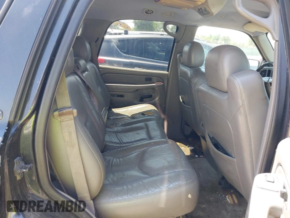 2004 Chevrolet Tahoe LS with VIN 1GNEC13T04R156427, listed as a IAAI auction lot 42333312 with 303,040 mi miles and . Bid and sale history available at DreamBid. Image 8.