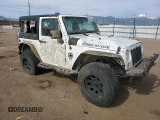 2016 Jeep Wrangler Willys Wheeler z VIN 1C4AJWAG4GL243285, wystawiony jako Copart lot #58035425 z przebiegiem 100 251 mil mil oraz Szkoda całkowita • Salvage title. Historia ofert i sprzedaży dostępna na DreamBid. Obrazek 4.