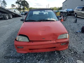 1992 Geo Metro z VIN JG1MR3369NK219164, wystawiony jako Copart lot #69017534 z przebiegiem 76 098 mil mil oraz Szkody całkowita. Historia ofert i sprzedaży dostępna na DreamBid. Obrazek 5.