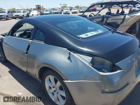 2004 Nissan 350Z Enthusiast z VIN JN1AZ34D74T164233, wystawiony jako IAAI lot #42509421 z przebiegiem 90 780 mil mil oraz . Historia ofert i sprzedaży dostępna na DreamBid. Obrazek 18.