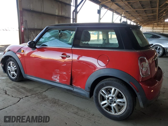 2012 MINI Hardtop with VIN WMWSU3C5XCT261853, listed as a Copart auction lot 49980285 with 110,638 mi miles and Salvage Title. Bid and sale history available at DreamBid. Image 2.