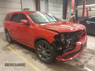 2016 Dodge Durango R/T with VIN 1C4SDJCT5GC437770, listed as a IAAI auction lot 41837091 with 148,384 mi miles and . Bid and sale history available at DreamBid. Image 1.