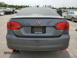 2012 Volkswagen Jetta TDI w/Premium & Nav z VIN 3VWLL7AJ8CM319746, wystawiony jako Copart lot #54313335 z przebiegiem 186 003 mil mil oraz Czysty tytuł • Clean title. Historia ofert i sprzedaży dostępna na DreamBid. Obrazek 6.