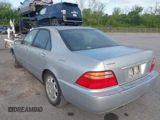 2000 Acura RL with VIN JH4KA9659YC003923, listed as a IAAI auction lot 42007244 with 1 mi miles. Bid and sale history available at carsss.com. Image 3.
