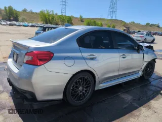 2018 Subaru WRX Premium with VIN JF1VA1C60J9809624, listed as a Copart auction lot 56700185 with 123,009 mi miles and Salvage title. Bid and sale history available at DreamBid. Image 3.