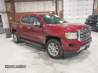2018 GMC Canyon 4WD SLT z VIN 1GTG6DEN8J1217669, wystawiony jako IAAI lot #42050904 z przebiegiem 58 013 mil mil oraz . Historia ofert i sprzedaży dostępna na DreamBid. Obrazek 1.