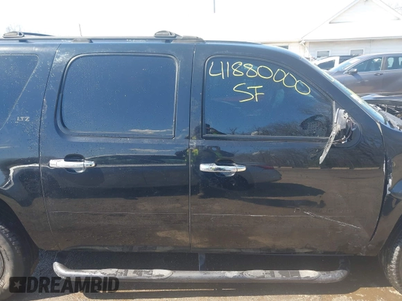 2007 Chevrolet Suburban LT with VIN 3GNFK16357G166135, listed as a IAAI auction lot 41880000 with 229,465 mi miles and . Bid and sale history available at DreamBid. Image 13.