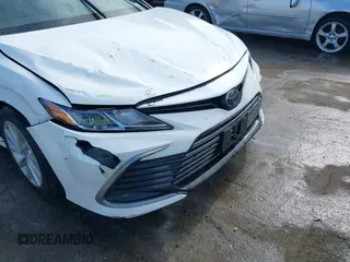 2024 Toyota Camry LE z VIN 4T1C11AK2RU864906, wystawiony jako IAAI lot #41638637 z przebiegiem 75 013 mil mil oraz . Historia ofert i sprzedaży dostępna na DreamBid. Obrazek 16.