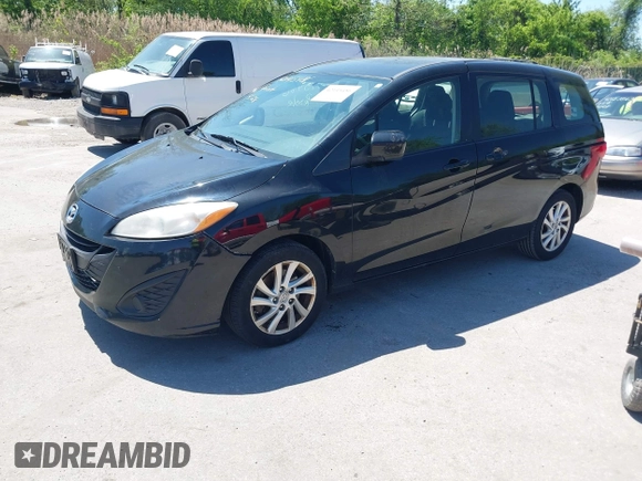 2012 Mazda 5 Sport with VIN JM1CW2BLXC0128507, listed as a IAAI auction lot 42145486 with 175,494 mi miles. Bid and sale history available at carsss.com. Image 2.