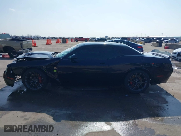 2021 Dodge Challenger R/T Scat Pack z VIN 2C3CDZFJXMH509833, wystawiony jako IAAI lot #41516858 z przebiegiem 66 880 mil mil oraz . Historia ofert i sprzedaży dostępna na DreamBid. Obrazek 14.
