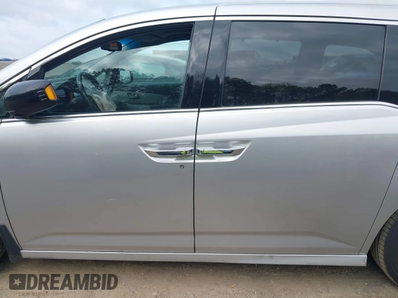 2012 Honda Odyssey Touring with VIN 5FNRL5H98CB026754, listed as a IAAI auction lot 41935562 with 165,626 mi miles. Bid and sale history available at carsss.com. Image 14.