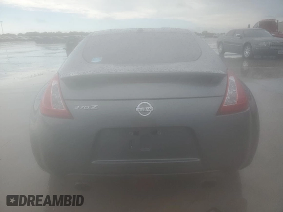 2015 Nissan 370Z Nismo z VIN JN1AZ4EH0FM444256, wystawiony jako Copart lot #54620065 z przebiegiem 78 626 mil mil oraz Szkoda całkowita • Salvage title. Historia ofert i sprzedaży dostępna na DreamBid. Obrazek 6.