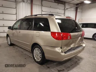 2009 Toyota Sienna XLE with VIN 5TDZK22CX9S236850, listed as a IAAI auction lot 42303935 with 201,583 mi miles and . Bid and sale history available at DreamBid. Image 3.