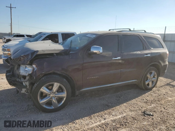2012 Dodge Durango Citadel with VIN 1C4SDHET0CC130328, listed as a Copart auction lot 74730864 with 186,392 mi miles and Salvage title. Bid and sale history available at DreamBid. Image 1.