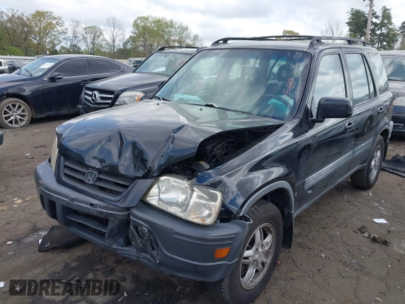 1999 Honda CR-V EX with VIN JHLRD1866XC055610, listed as a IAAI auction lot 41953453 with 152,557 mi miles. Bid and sale history available at carsss.com. Image 2.