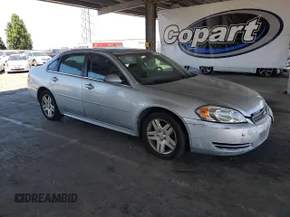 2015 Chevrolet Impala LT with VIN 2G1WB5E34F1163311, listed as a Copart auction lot 64336575 with 118,336 mi miles and Salvage title. Bid and sale history available at DreamBid. Image 4.