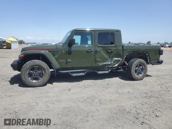 2022 Jeep Gladiator Rubicon с VIN 1C6JJTBGXNL155407, выставлен на аукционе Copart как лот 57522915 с пробегом 12 809 миль миль и Списание • Salvage title. История ставок и продаж доступна на DreamBid. Изображение 1.
