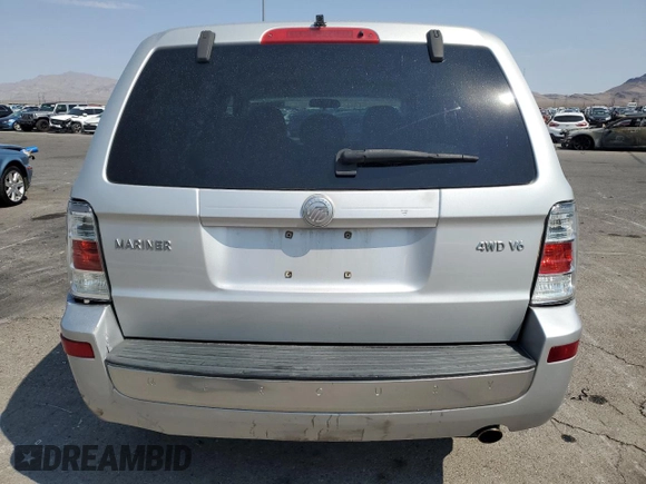 2008 Mercury Mariner z VIN 4M2CU91168KJ40089, wystawiony jako Copart lot #64688995 z przebiegiem 196 758 mil mil oraz Szkoda całkowita • Salvage title. Historia ofert i sprzedaży dostępna na DreamBid. Obrazek 6.