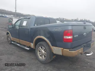 2005 Ford F-150 XLT with VIN 1FTPW14565KE80310, listed as a IAAI auction lot 41874484 with 173,315 mi miles. Bid and sale history available at carsss.com. Image 3.
