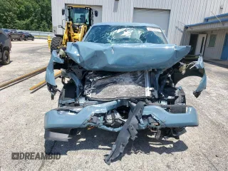 2023 Ford F-150 XL with VIN 1FTEW1CP7PKD02399, listed as a Copart auction lot 60738155 with 23,059 mi miles and Salvage title. Bid and sale history available at DreamBid. Image 5.