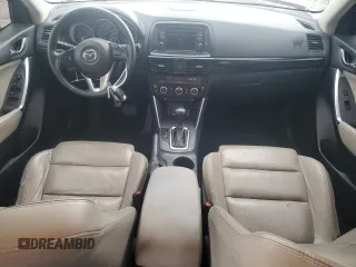 2015 Mazda CX-5 Grand Touring with VIN JM3KE2DY6F0504784, listed as a Copart auction lot 47671705 with 174,682 mi miles and Salvage Title. Bid and sale history available at carsss.com. Image 8.