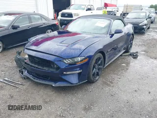 2020 Ford Mustang EcoBoost z VIN 1FATP8UH8L5106720, wystawiony jako IAAI lot #42128952 z przebiegiem 102 234 mil mil oraz . Historia ofert i sprzedaży dostępna na DreamBid. Obrazek 2.