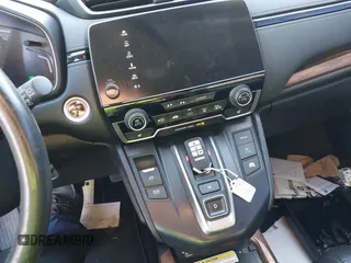2021 Honda CR-V Touring with VIN 7FART6H97ME010816, listed as a IAAI auction lot 42256962 with 86,223 mi miles and . Bid and sale history available at DreamBid. Image 11.