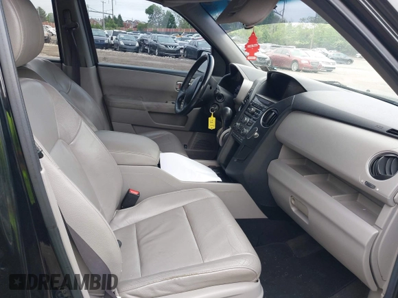 2012 Honda Pilot EX-L with VIN 5FNYF4H52CB068007, listed as a IAAI auction lot 42184390 with 137,126 mi miles and . Bid and sale history available at DreamBid. Image 5.
