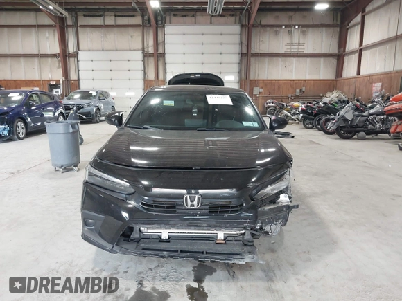 2023 Honda Civic Sport with VIN 2HGFE2F52PH505538, listed as a IAAI auction lot 42447559 with 36,621 mi miles and . Bid and sale history available at DreamBid. Image 12.
