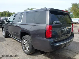 2015 Chevrolet Suburban LTZ with VIN 1GNSKKKC6FR243250, listed as a IAAI auction lot 40464836 with 120,030 mi miles. Bid and sale history available at carsss.com. Image 3.