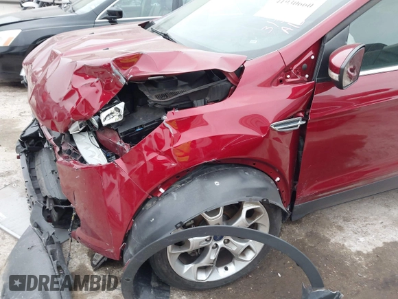 2015 Ford Escape Titanium with VIN 1FMCU0J98FUC07196, listed as a IAAI auction lot 41930660 with 51,161 mi miles and . Bid and sale history available at DreamBid. Image 6.