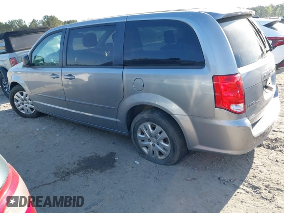 2016 Dodge Grand Caravan SE with VIN 2C4RDGBG5GR314936, listed as a IAAI auction lot 41889795 with 192,621 mi miles and . Bid and sale history available at DreamBid. Image 3.